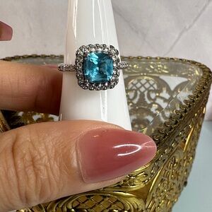 Elegant Sterling Silver and Aquamarine Ring with White Sapphire